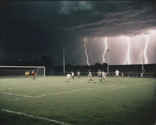 floodlight,soccer field,lightning strike,lightening,floodlights,lightning storm,lightning bolt,lightning,thunderheads,athletic field,children's soccer,thunderstorm,football pitch,thunderbolt,youth sports,shock field,lightning damage,bolts,soccer,football field,Photography,Documentary Photography,Documentary Photography 02