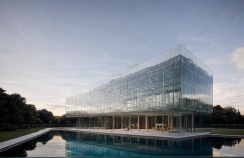 glass facade,glass building,glass facades,structural glass,water cube,glass wall,glass blocks,chancellery,glass pyramid,autostadt wolfsburg,mclaren automotive,aqua studio,glass panes,modern architecture,archidaily,new building,corporate headquarters,office building,kirrarchitecture,cube house