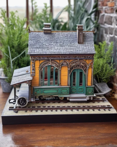 miniature house,wooden train,wooden railway,model train,a small station,model house,model train figure,train depot,train wagon,railroad station,desk organizer,clay house,model railway,toy train,locomotive shed,little house,small house,dolls houses,narrow gauge,freight depot,Illustration,Paper based,Paper Based 06
