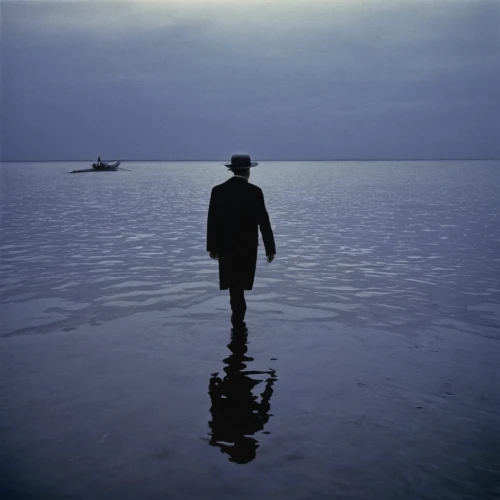 man at the sea,walk on water,the shallow sea,the man in the water,wading,seafarer,the people in the sea,el mar,the endless sea,version john the fisherman,exploration of the sea,pilgrim,salt-flats,the wadden sea,silhouette of man,blue sea,sea man,adrift,album cover,to be alone,Photography,Black and white photography,Black and White Photography 14