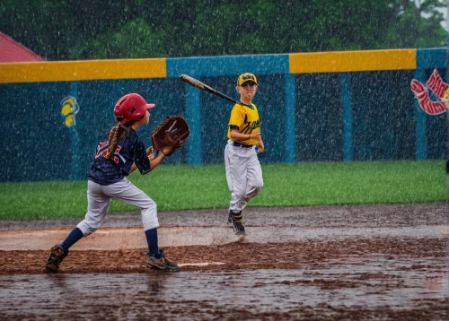 youth sports,little league,baseball,indoor games and sports,softball,baseball diamond,baseball field,outdoor games,little leaguer,monsoon,bat-and-ball games,baseball umpire,rain field,umpire,sports,college softball,rain pants,baseball protective gear,baseball players,monsoon banner,Photography,Documentary Photography,Documentary Photography 27