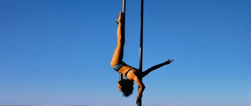 pole climbing (gymnastic),aerialist,rope (rhythmic gymnastics),pole vaulter,discobolus,pole dance,figure of paragliding,pole vault,hanged man,artistic gymnastics,circus aerial hoop,ball (rhythmic gymnastics),free solo climbing,bow and arrow,gymnastic rings,bungee jumping,aerial hoop,static trapeze,hanged,bow arrow,Conceptual Art,Sci-Fi,Sci-Fi 21