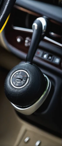 gear shift,gear stick,automobile pedal,ignition key,steering wheel,gear lever,car dashboard,control car,leather steering wheel,3-speed,automotive decor,car key,dashboard,start-button,car keys,bell button,fourth generation lexus ls,car interior,steering,auto accessories,Illustration,Paper based,Paper Based 22