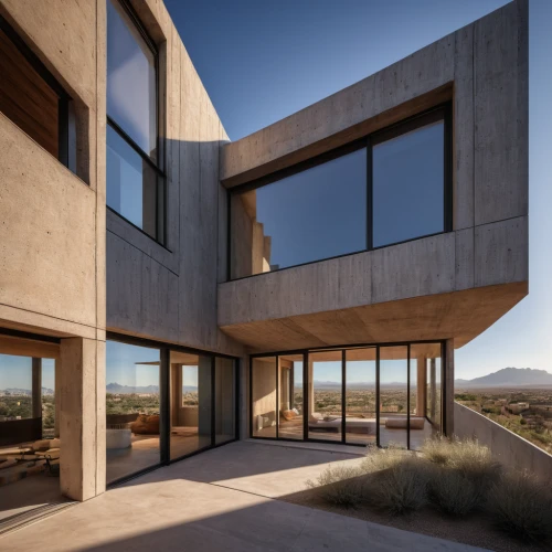 dunes house,cubic house,exposed concrete,modern architecture,cube house,concrete construction,mojave,corten steel,glass facade,frame house,reinforced concrete,rhyolite,mirror house,metal cladding,archidaily,structural glass,lattice windows,dune ridge,modern house,concrete blocks,Photography,General,Natural