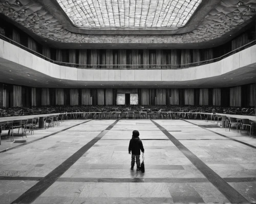 empty hall,empty interior,hall of nations,emptiness,the center of symmetry,hall of the fallen,girl walking away,deserted,factory hall,louvre,empty space,conference hall,panopticon,marble palace,guggenheim museum,ballroom,lecture hall,woman walking,athens art school,solitary,Photography,Black and white photography,Black and White Photography 02