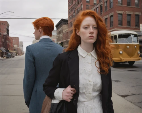 redheads,woman in menswear,vintage man and woman,eurythmics,woman walking,redheaded,ginger rodgers,pedestrian,a pedestrian,redhair,pedestrians,redhead doll,red-haired,two people,man and woman,red head,streetcar,postmasters,ginger family,girl walking away,Photography,Documentary Photography,Documentary Photography 07