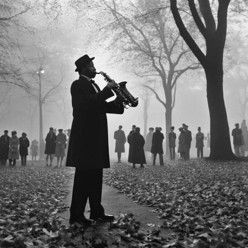 man with saxophone,trumpet player,saxophone playing man,trumpeter,itinerant musician,saxophonist,blues and jazz singer,trumpet climber,saxophone player,jazz,jazz singer,silent film,jazz silhouettes,the flute,trumpet,big band,brass band,trombone player,clarinetist,flugelhorn,Photography,Black and white photography,Black and White Photography 10