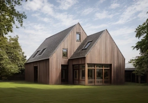 timber house,danish house,frisian house,inverted cottage,wooden house,house hevelius,corten steel,dunes house,frame house,field barn,clay house,forest chapel,summer house,archidaily,house shape,slate roof,wooden church,country house,metal cladding,kirrarchitecture