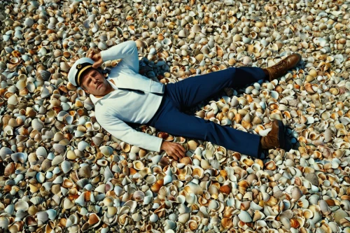 pebble,pétanque,balanced pebbles,salt harvesting,beach shell,grains of salt,pebbles,chesil beach,beachy head,seashells,man at the sea,salt field,in shells,sea shell,beached,gravel,rock salt,beach glass,head stuck in the sand,chalk cliff,Photography,Documentary Photography,Documentary Photography 06