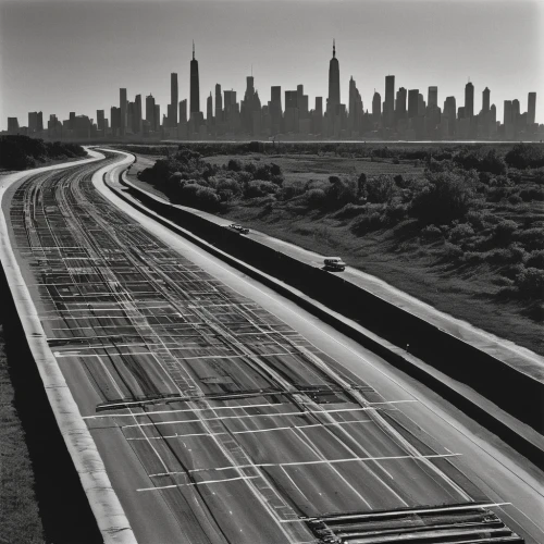 rail traffic,city highway,rail transport,vanishing point,road traffic,highway,rail road,transport and traffic,moving walkway,freeway,elevated railway,expressway,dubai,traffic queue,pipeline transport,road surface,high-speed rail,oil track,railway rails,conveyor belt,Photography,Black and white photography,Black and White Photography 14