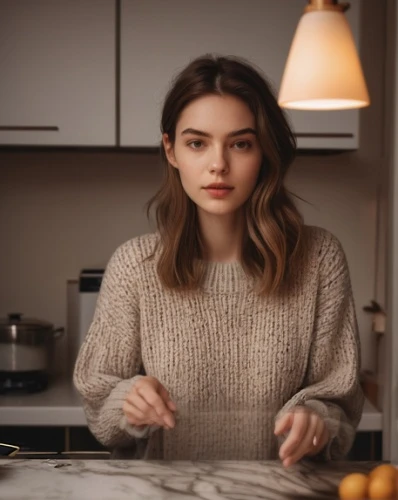 girl in the kitchen,girl with cereal bowl,woman eating apple,girl with bread-and-butter,commercial,barista,cappuccino,sweater,cardigan,espresso,woman holding pie,cooking show,woman drinking coffee,brigadeiros,tea,holding cup,beanie,crème anglaise,cute,food and cooking