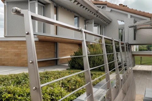 metal railing,railings,chain-link fencing,folding roof,rain gutter,handrails,steel scaffolding,pergola,handrail,wine rack,exterior decoration,metal cladding,aileron,fence element,moveable bridge,structural glass,outdoor structure,railing,steel beams,wire fencing