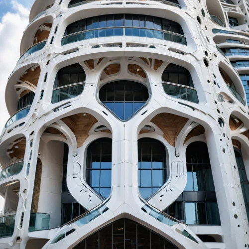 hotel w barcelona,oasis of seas,largest hotel in dubai,building honeycomb,honeycomb structure,hotel barcelona city and coast,futuristic architecture,jewelry（architecture）,balconies,facade panels,glass facade,singapore landmark,modern architecture,glass facades,arhitecture,multi-story structure,penthouse apartment,building structure,gaudí,multi-storey,Photography,General,Natural