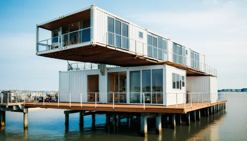 cube stilt houses,stilt house,cubic house,house by the water,stilt houses,houseboat,floating huts,beachhouse,federsee pier,floating restaurant,cube house,shipping containers,dunes house,beach house,lifeguard tower,house of the sea,shipping container,modern architecture,boat house,pier 14,Photography,Documentary Photography,Documentary Photography 01