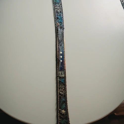 western concert flute,snake staff,reed belt,scabbard,belt,traditional bow,bookmark with flowers,peacock feather,flowered tie,wampum snake,mosaic glass,incense stick,patch panel,violin neck,block flute,belts,transverse flute,belt with stockings,long glass,diadem