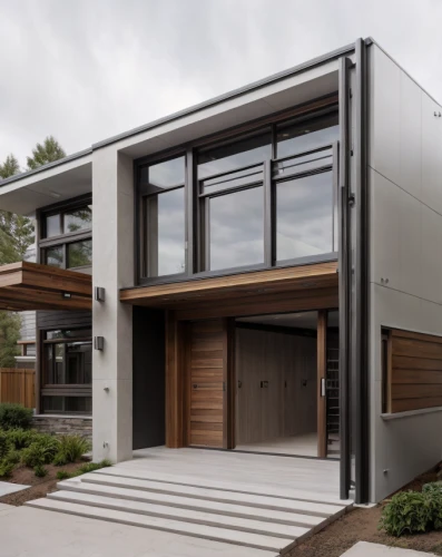 modern house,modern architecture,cubic house,smart house,cube house,metal cladding,garage door,smart home,mid century house,dunes house,modern style,folding roof,timber house,frame house,residential house,contemporary,wooden house,house shape,eco-construction,two story house