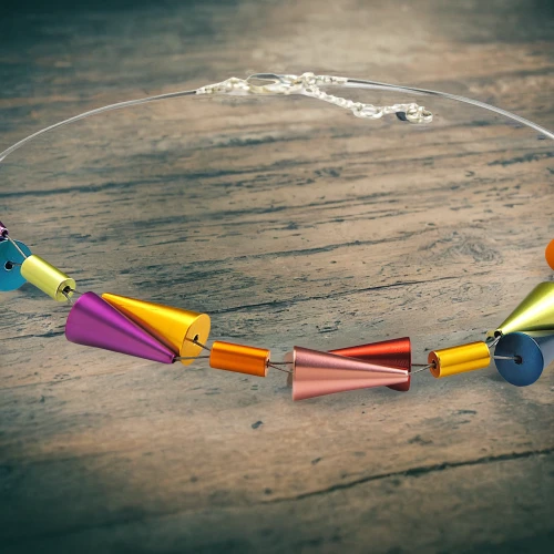 pipe cleaner,rainbeads,children jump rope,fishing lure,dna strand,data transfer cable,paper chain,serial cable,usb cable,rope (rhythmic gymnastics),dna helix,hoop (rhythmic gymnastics),ribbon (rhythmic gymnastics),plastic beads,earpieces,earplug,bird toy,wire entanglement,lantern string,gymnastic rings