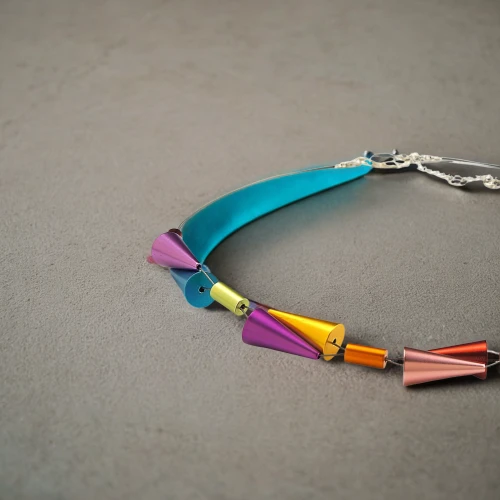 alligator clips,tongue-and-groove pliers,necklace with winged heart,diagonal pliers,bracelet,alligator clip,data transfer cable,bracelet jewelry,dog collar,slip joint pliers,tennis racket accessory,usb cable,ribbon (rhythmic gymnastics),round-nose pliers,razor ribbon,anklet,bracelets,jewelry florets,needle-nose pliers,gaspipe pliers
