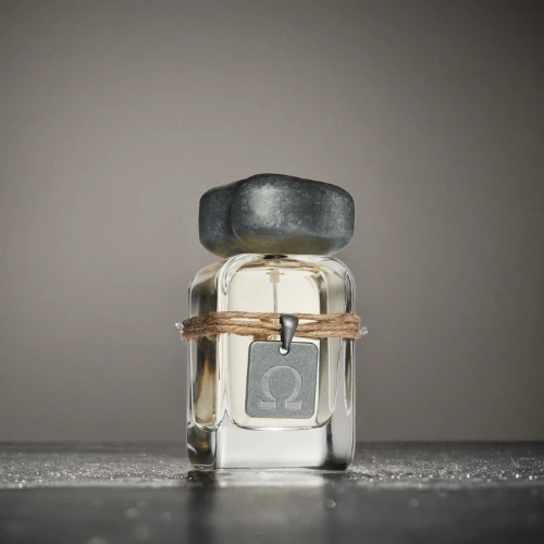 perfume bottle,isolated product image,poison bottle,glass jar,parfum,coconut perfume,perfume bottles,empty jar,creating perfume,briquet griffon vendéen,isolated bottle,product photography,bottle surface,tanacetum balsamita,coconut oil in glass jar,cosmetic oil,fragrance,glass container,halogen bulb,message in a bottle