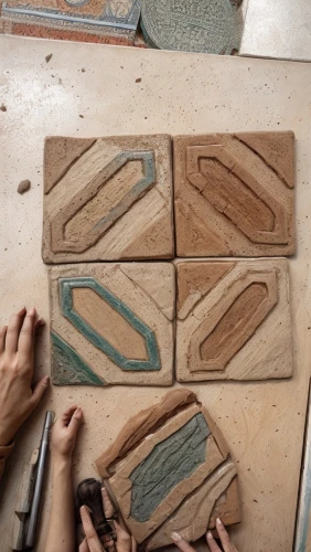 terracotta tiles,sanding block,wood type,wood blocks,ceramic tile,clay tile,wooden letters,wood block,woodtype,wooden boards,clay packaging,tiles shapes,wood board,facade panels,clay floor,woodworking,stone carving,wooden board,molding,patterned wood decoration,Commercial Space,Working Space,None