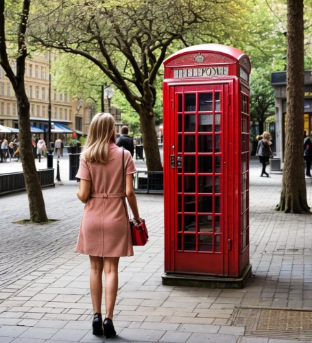 telephone booth,phone booth,london,payphone,pay phone,city of london,red coat,united kingdom,newspaper box,postbox,uk,british,girl walking away,girl in a long dress from the back,calling,post box,street photography,phone call,red skirt,shoreditch