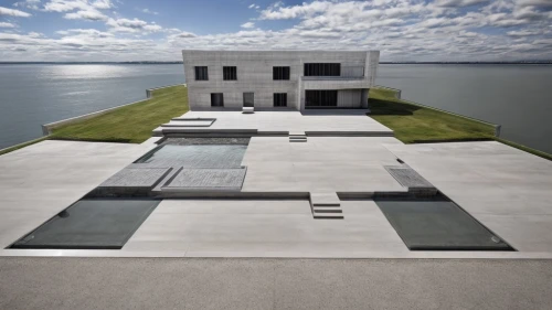 house by the water,dunes house,lago grey,house with lake,mirror house,exposed concrete,cubic house,cube house,flat roof,danish house,house hevelius,modern architecture,modern house,frame house,residential house,contemporary,archidaily,infinity swimming pool,luxury property,house of the sea,Architecture,Villa Residence,Modern,Minimalist Serenity