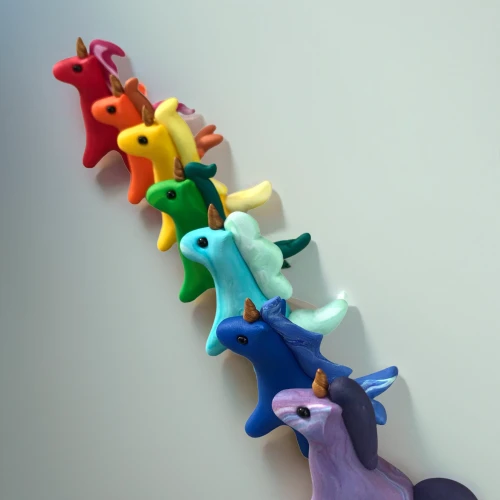 paper scrapbook clamps,clothe pegs,scrapbook clamps,paper chain,wooden toys,motor skills toy,coat hooks,animal balloons,rainbow tags,ponies,children toys,climbing equipment,children's toys,suction nozzles,column of dice,play figures,coat hangers,suction cups,horse herd,dog toys