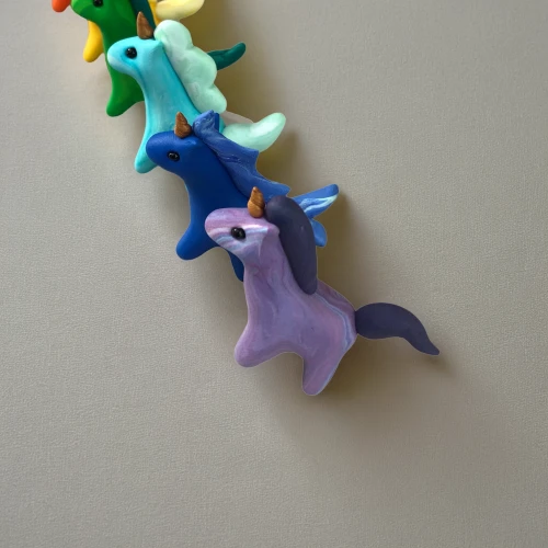 starfishes,plasticine,paper chain,clothe pegs,coat hooks,whimsical animals,origami paper,pacifier tree,paper scrapbook clamps,bird toy,bronze hammerhead shark,hippocampus,origami,advent decoration,hanging decoration,sea creatures,sea-horse,wall decoration,dog toys,animal balloons