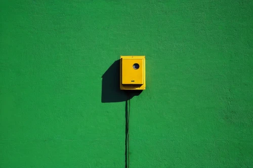 hanging traffic light,green light,traffic light,stoplight,light switch,yellow wall,green electricity,traffic light with heart,yellow light,traffic signal,yellow brick wall,exit sign,green wallpaper,heart traffic light,traffic lights,doorbell,traffic signals,color wall,wall,automotive parking light,Photography,Documentary Photography,Documentary Photography 06