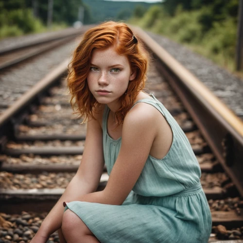 the girl at the station,portrait photography,railroad,red heart on railway,rail track,portrait photographers,railroad track,railtrack,rail road,railroad tracks,train tracks,railway track,red-haired,redhead doll,train track,red head,railway,young woman,worried girl,railway line,Photography,General,Cinematic