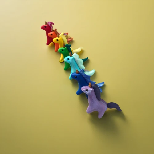 animal balloons,miniature figures,colored pins,wooden toys,paper chain,clothe pegs,origami paper,play figures,colorful star scatters,whimsical animals,children's toys,children toys,push pins,colorful foil background,paper scrapbook clamps,jigsaw puzzle,origami,game pieces,crocodile clips,rainbow tags