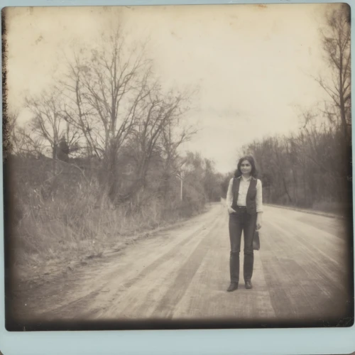 ambrotype,vintage woman,polaroid pictures,vintage girl,woman walking,dirt road,road forgotten,vintage background,lubitel 2,photograph album,agfa isolette,box camera,a girl with a camera,missouri,vintage women,girl walking away,roadside,country road,vintage photo,indiana,Photography,Documentary Photography,Documentary Photography 03