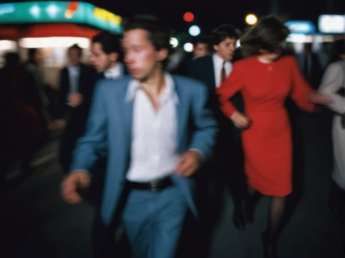 man in red dress,people walking,pedestrian,a pedestrian,1960's,black businessman,woman walking,60s,vintage man and woman,pedestrians,1967,1965,fifties,blurred vision,run,blur,to run,walking man,girl walking away,spy visual,Photography,Fashion Photography,Fashion Photography 19