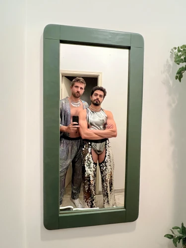 mirror frame,holding a frame,framed paper,digital photo frame,silver frame,outside mirror,gay men,framed,gay couple,social,picture frame,white frame,wood mirror,ivy frame,builders,botanical frame,mirror reflection,gay love,boy's room picture,copper frame