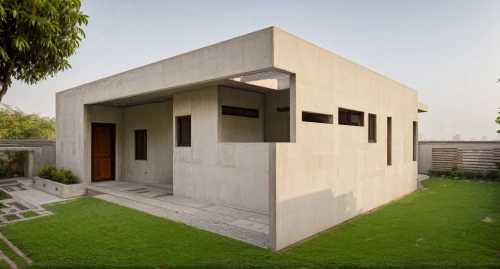 build by mirza golam pir,cubic house,house shape,cube house,residential house,stucco frame,exposed concrete,concrete blocks,frame house,concrete construction,cement block,modern architecture,stucco wall,modern house,dunes house,reinforced concrete,folding roof,islamic architectural,timber house,inverted cottage