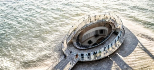 water stairs,spiral stairs,winding steps,lifeguard tower,maiden's tower views,spiral staircase,circular staircase,winding staircase,observation tower,pier,spiralling,bird's eye view,vertigo,lookout tower,paddlewheel,the observation deck,old pier,baku eye,icon steps,view from above