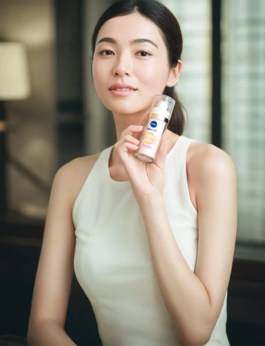 woman holding a smartphone,glucose meter,alipay,wireless tens unit,natural cosmetic,huawei,pocari sweat,women's cosmetics,cosmetic products,mobile phone battery,oil cosmetic,micro sim,dermatologist,face cream,bluetooth headset,perfume bottle,asian woman,japanese woman,pulse oximeter,lip balm