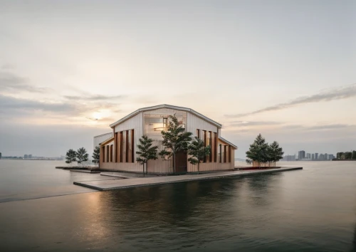 house by the water,cube stilt houses,floating huts,wooden sauna,floating stage,marina bay,marina bay sands,boat house,stilt house,singapore,singapore landmark,sunken church,island church,summer house,sharjah,archidaily,boat shed,pool house,santiago calatrava,suzhou,Architecture,General,Masterpiece,Vernacular Modernism