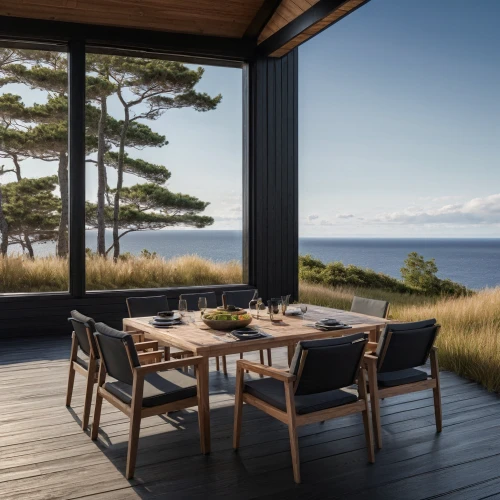 outdoor table and chairs,dunes house,outdoor dining,outdoor furniture,summer house,outdoor table,wooden decking,danish furniture,house by the water,patio furniture,breakfast room,window with sea view,scandinavian style,garden furniture,breakfast table,seaside view,landscape design sydney,landscape designers sydney,corten steel,danish house
