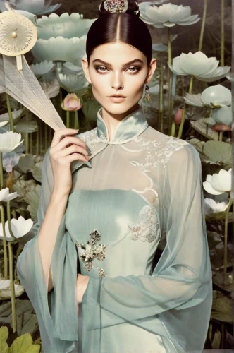 flower of water-lily,fashion illustration,hepburn,photomontage,water-the sword lily,water lotus,waterlily,perfume bottle,photomanipulation,lily pad,lily water,nelumbo,water lily,flora,lotus effect,elven flower,creating perfume,lotus with hands,image manipulation,audrey hepburn