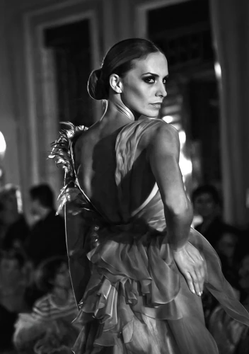 fashion show,flamenco,runway,young model istanbul,evening dress,elegance,black swan,tulle,dress walk black,fashion design,showpiece,femininity,catwalk,haute couture,fabric flowers,flower girl,neoclassic,twirling,ball gown,scent of roses