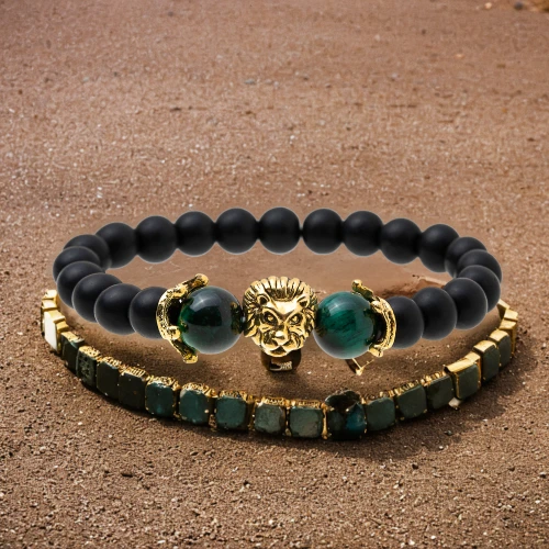 gold bracelet,bracelet jewelry,semi precious stone,luxury accessories,bracelet,masai lion,grave jewelry,bracelets,women's accessories,malachite,diadem,king crown,accessories,royal crown,cartier,king tut,lion number,african lion,buddhist prayer beads,pharaohs
