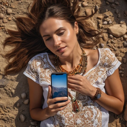 woman holding a smartphone,corona app,music on your smartphone,mobile phone accessories,mobile banking,wearables,the app on phone,iphone 6s plus,watch phone,girl on the dune,sprint woman,mobile application,ifa g5,smart watch,mobile device,samsung galaxy s3,smart phone,women in technology,samsung galaxy,handset,Photography,General,Natural