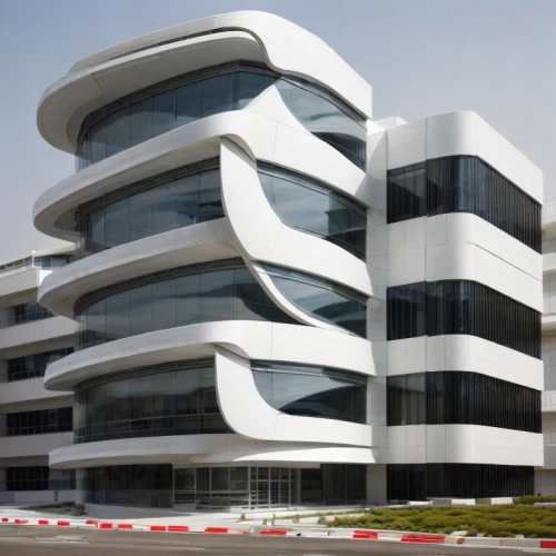 yas marina circuit,largest hotel in dubai,abu-dhabi,abu dhabi,mclaren automotive,dhabi,multi storey car park,office building,uae,modern building,facade panels,modern architecture,futuristic architecture,car showroom,united arab emirates,arhitecture,glass facade,new building,jumeirah,mercedes museum