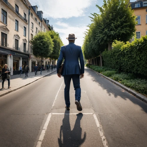 walking man,black businessman,passepartout,a pedestrian,white-collar worker,people walking,standing man,pedestrian,man with umbrella,street photography,one-way street,street scene,a black man on a suit,pedestrians,reconnoiter,blockchain management,woman walking,pedestrian zone,online path travel,prospects for the future,Photography,General,Natural