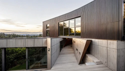 timber house,dunes house,wood deck,cubic house,wooden house,corten steel,wooden decking,metal cladding,wooden windows,exposed concrete,modern house,wooden facade,wooden wall,mirror house,cube house,modern architecture,wood window,archidaily,wooden planks,wood fence,Architecture,General,Modern,Mid-Century Modern