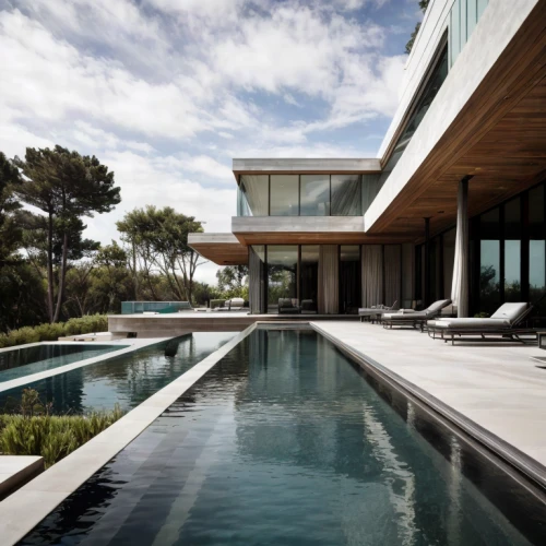 dunes house,modern house,pool house,house by the water,modern architecture,luxury property,luxury home,beach house,mansion,summer house,infinity swimming pool,holiday villa,luxury home interior,glass wall,beautiful home,glass facade,residential house,private house,roof landscape,crib