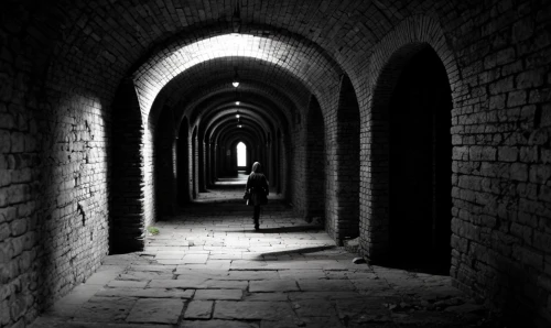 corridor,passage,catacombs,hallway,caravansary,crypt,creepy doorway,wall tunnel,cellar,hall of the fallen,cloister,archway,tunnel,hollow way,portcullis,monochrome photography,threshold,ibn tulun,cistern,blackandwhitephotography