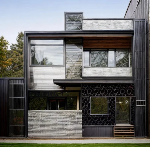 lattice windows,metal cladding,cubic house,timber house,modern house,glass facade,modern architecture,frame house,wooden facade,cube house,wooden house,house shape,ruhl house,geometric style,metal roof,folding roof,facade panels,smart house,thermal insulation,contemporary,Architecture,Commercial Building,Modern,Mid-Century Modern