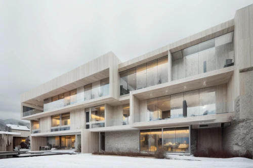 exposed concrete,cubic house,brutalist architecture,kirrarchitecture,dunes house,archidaily,modern architecture,residential,winter house,snowhotel,nuuk,cube house,snow roof,ludwig erhard haus,chancellery,glass facade,snow house,modern house,espoo,residential house